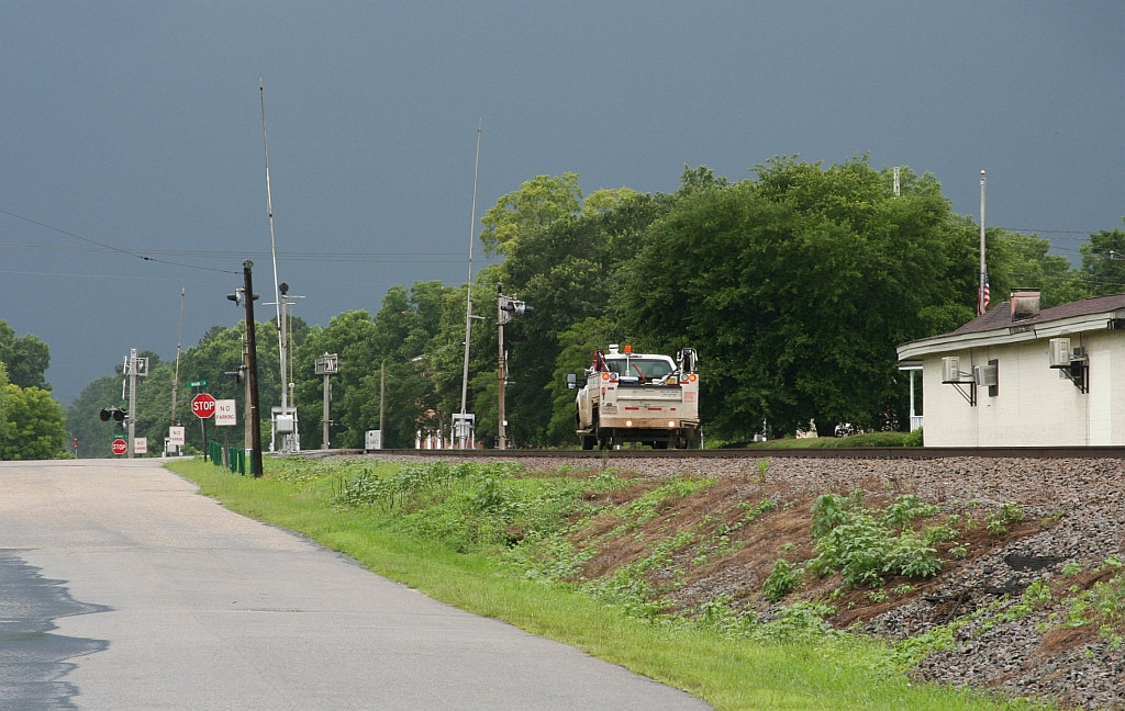 Brave little hirailer heading toward a monster storm